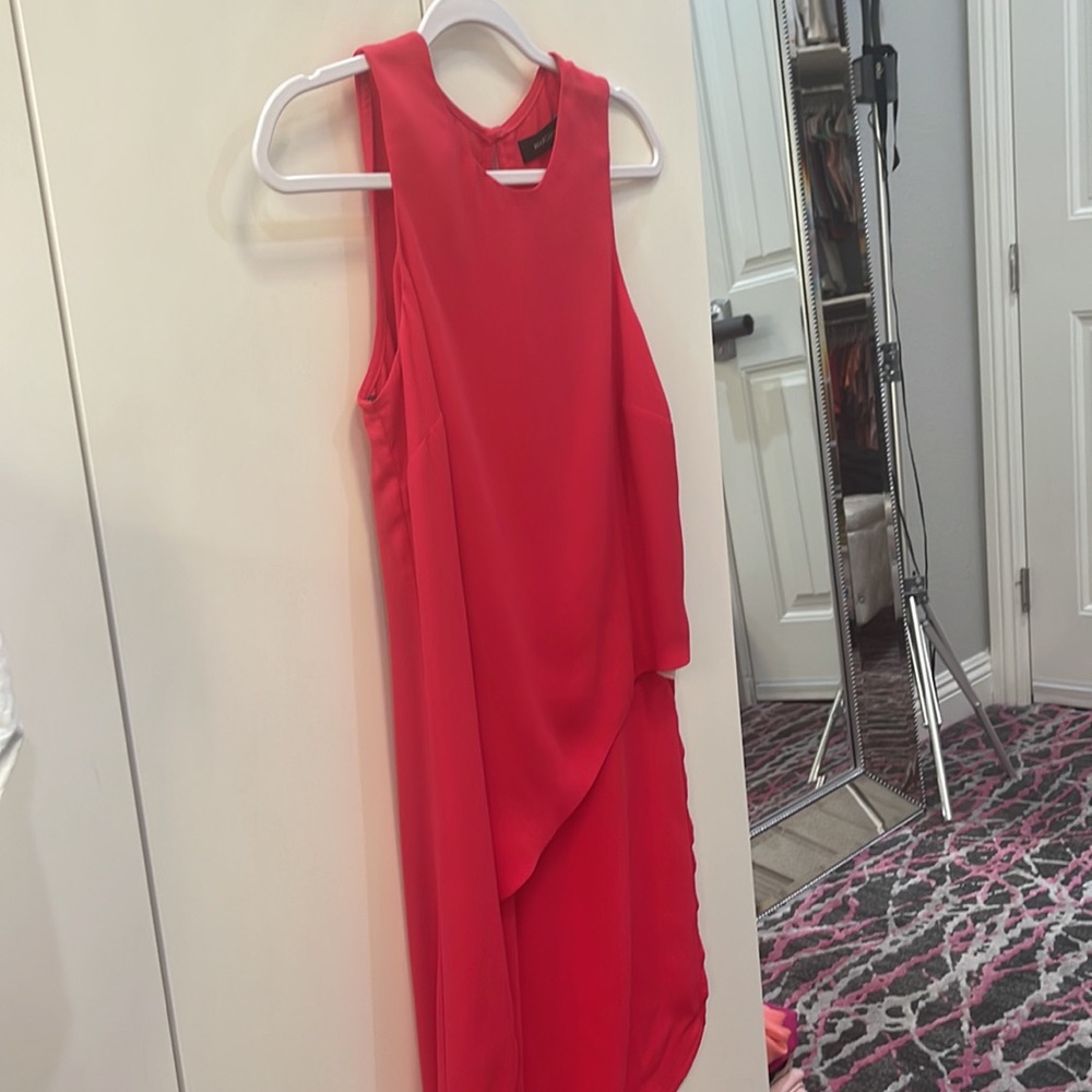 Marciano side flowing asymmetrical tank.